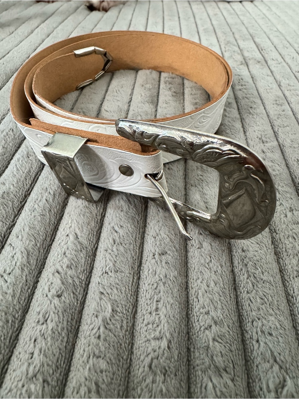 White Embossed Leather Belt with Decorative Silver Buckle